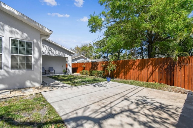 view of patio with fence