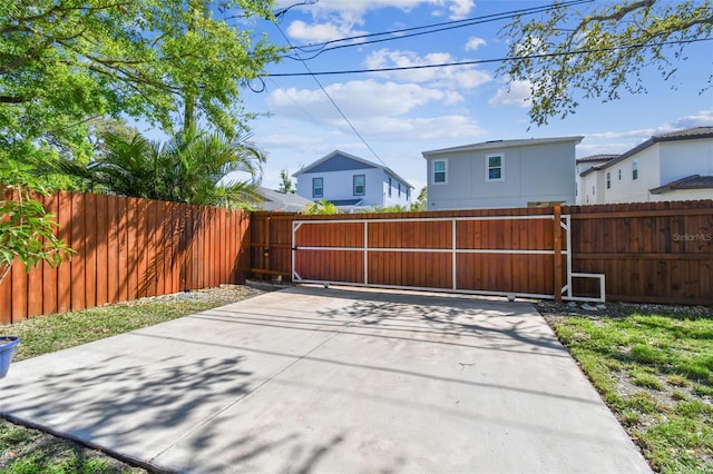 view of patio / terrace with fence and a gate