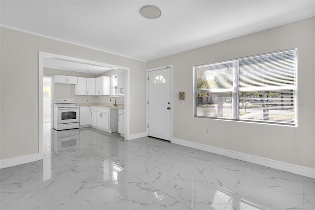 entrance foyer with baseboards and marble finish floor