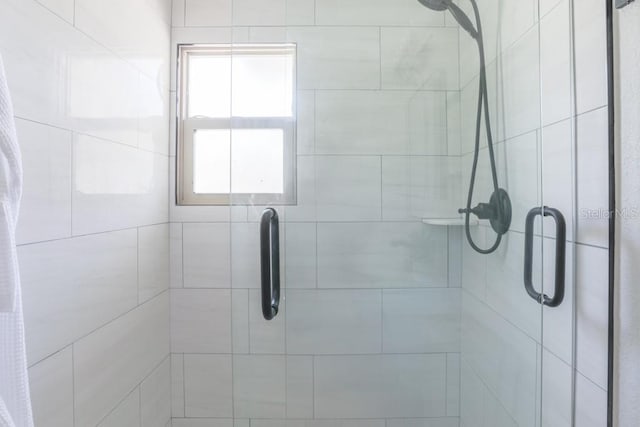 bathroom with a stall shower