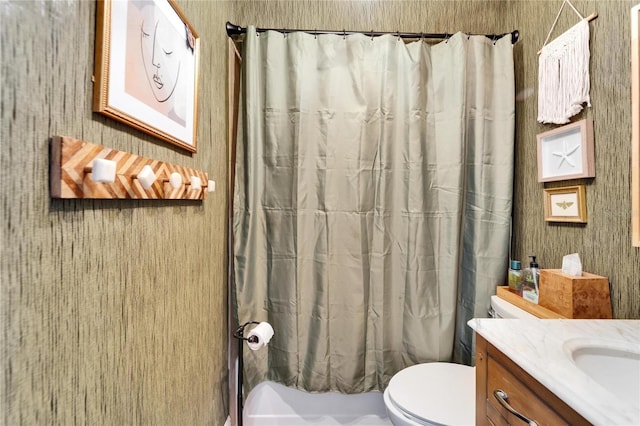 full bathroom featuring curtained shower, toilet, and vanity