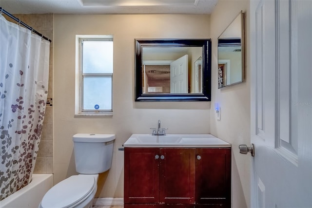 bathroom with shower / bathtub combination with curtain, toilet, and vanity