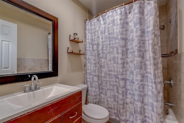 bathroom featuring vanity, toilet, and shower / tub combo with curtain