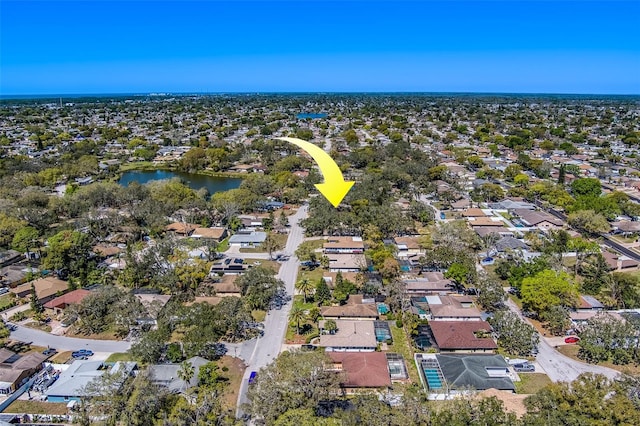 aerial view featuring a residential view and a water view