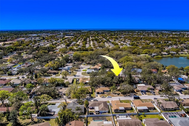 bird's eye view with a residential view and a water view