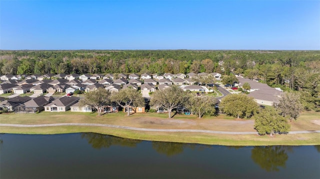 bird's eye view with a forest view, a residential view, and a water view