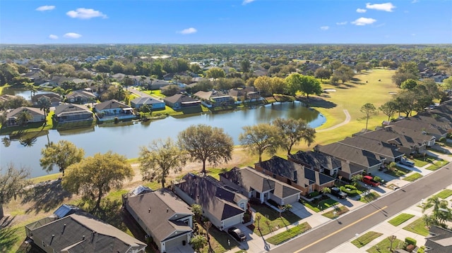 bird's eye view with a residential view and a water view