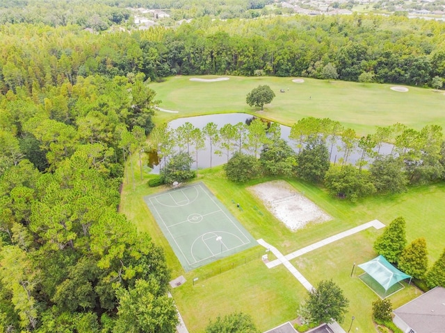 bird's eye view with a water view, a wooded view, and golf course view