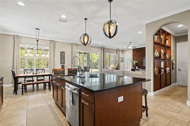 kitchen with visible vents, plenty of natural light, stainless steel dishwasher, and a sink