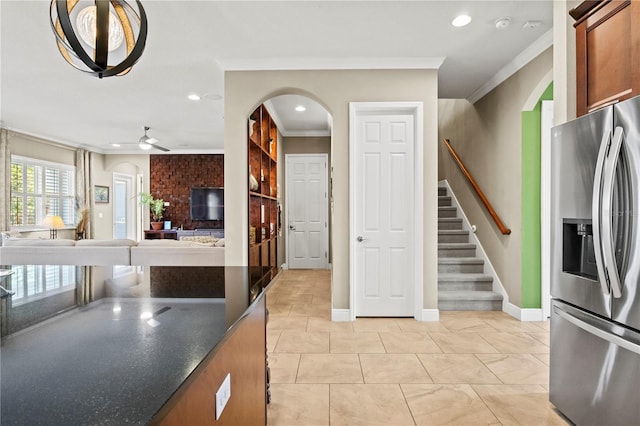 kitchen featuring recessed lighting, stainless steel fridge, ceiling fan, and crown molding