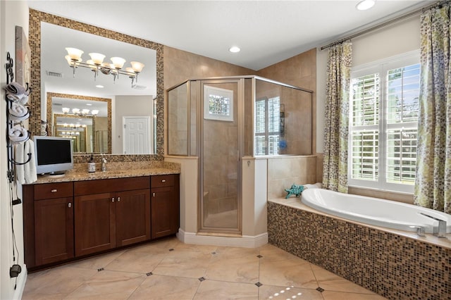 full bath with visible vents, a garden tub, a shower stall, tile patterned flooring, and vanity