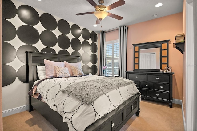 bedroom with recessed lighting, baseboards, and light colored carpet