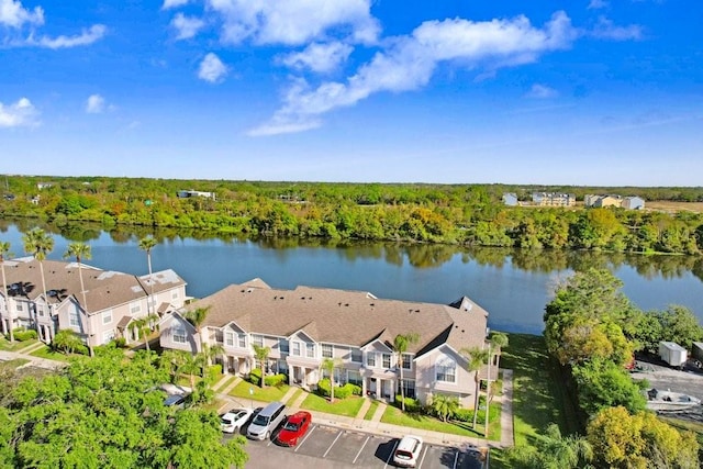 birds eye view of property featuring a residential view and a water view