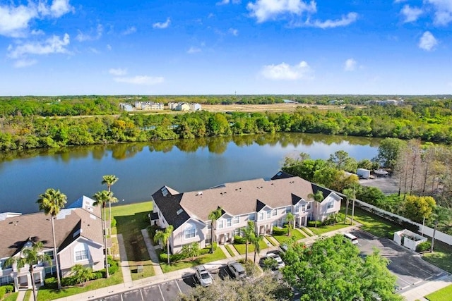 birds eye view of property featuring a residential view and a water view