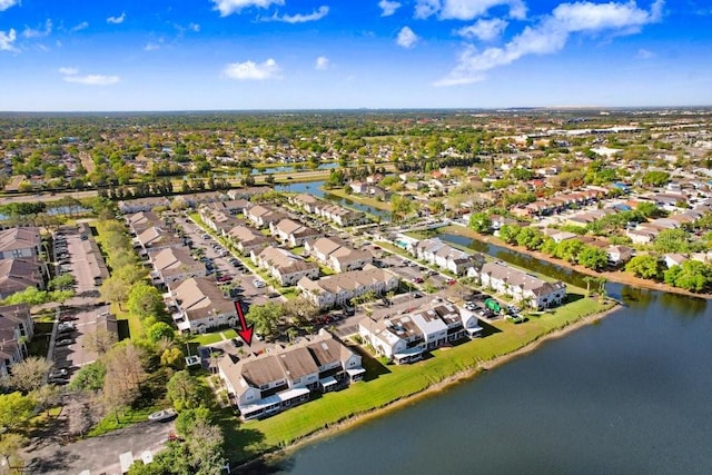 aerial view with a residential view and a water view