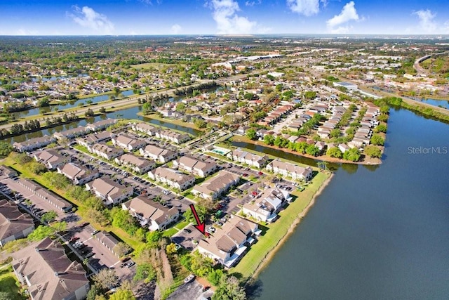 aerial view with a residential view and a water view