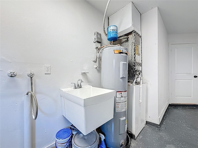 utility room featuring a sink and water heater