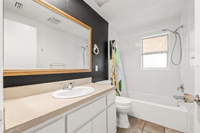 full bathroom featuring vanity, toilet, visible vents, and shower / bath combo with shower curtain