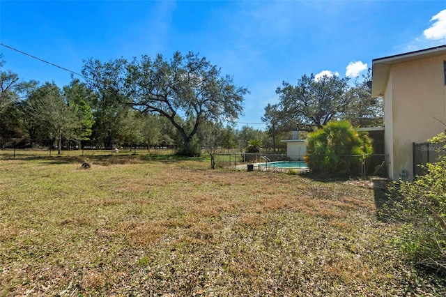 view of yard featuring fence