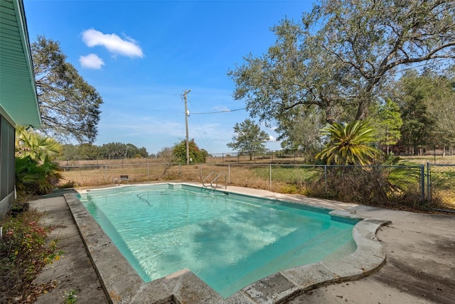 view of swimming pool featuring a fenced backyard and a fenced in pool