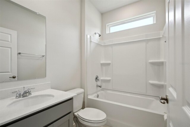 45 Perkins Ln, Palm Coast, FL 32164 - full bath featuring toilet, bathtub / shower combination, and vanity