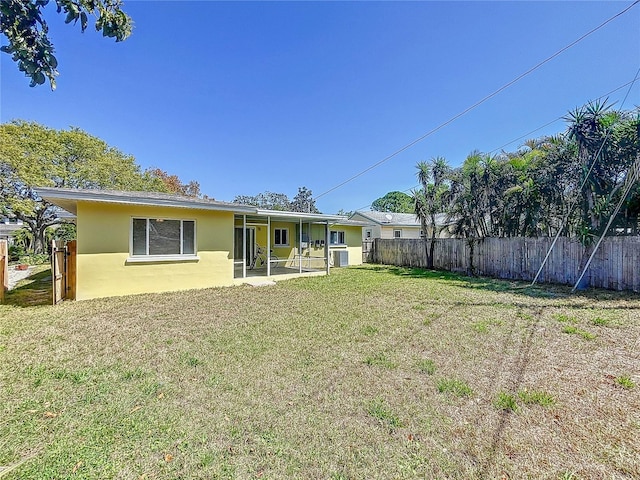 view of yard with a patio and fence