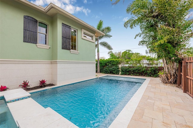 view of pool featuring a fenced backyard, a fenced in pool, and a patio