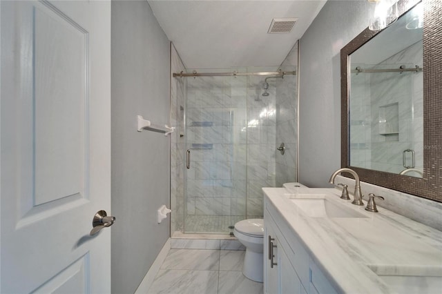 bathroom featuring a shower stall, toilet, visible vents, and marble finish floor