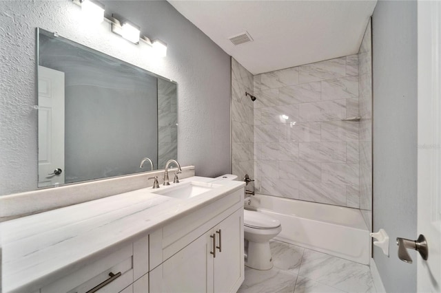 full bathroom featuring vanity, bathtub / shower combination, toilet, a textured wall, and marble finish floor