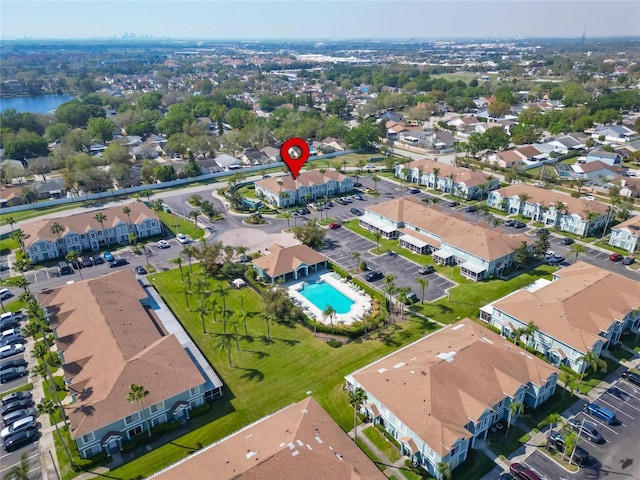 aerial view featuring a residential view and a water view