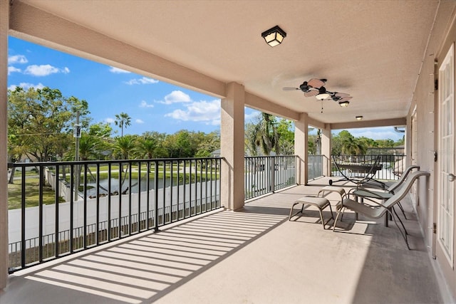 balcony featuring a ceiling fan