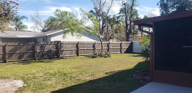 view of yard featuring fence