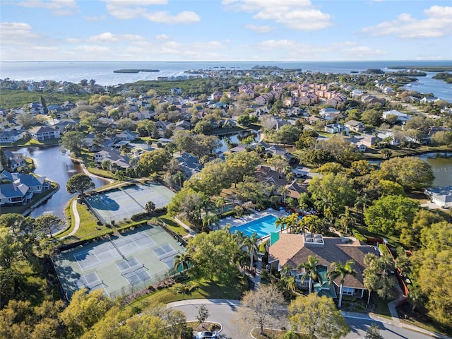 birds eye view of property featuring a residential view and a water view