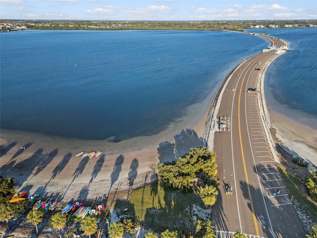 bird's eye view with a beach view and a water view