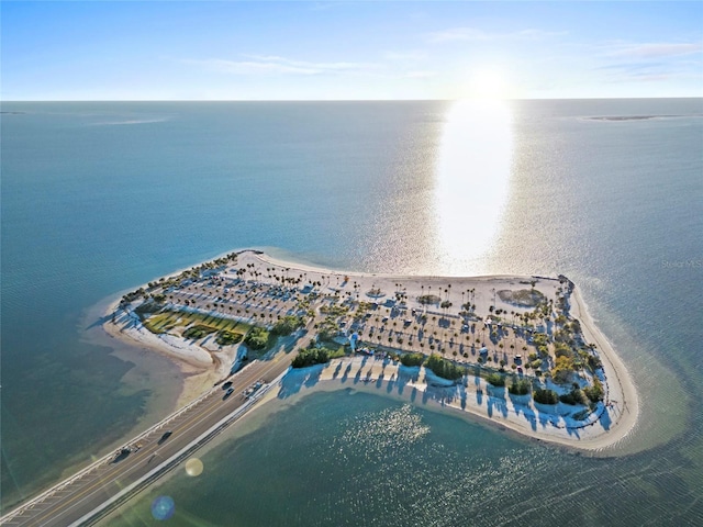 bird's eye view with a beach view and a water view