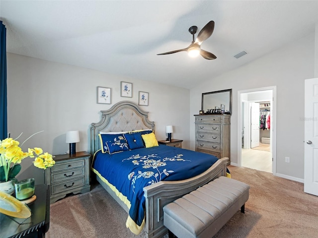 bedroom with visible vents, a ceiling fan, carpet, baseboards, and vaulted ceiling