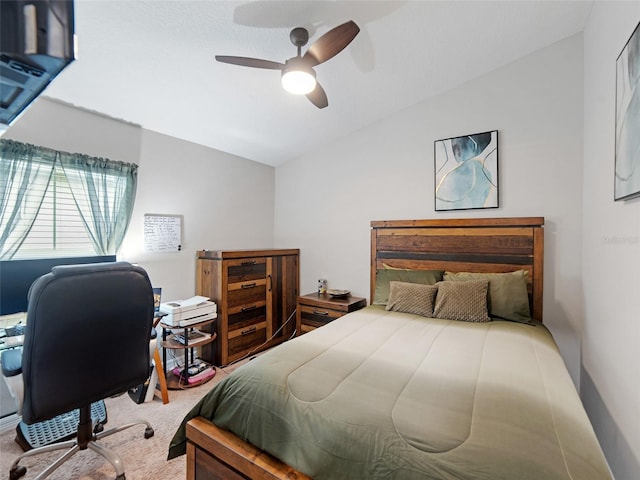 bedroom with carpet flooring, a ceiling fan, and lofted ceiling