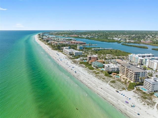 bird's eye view featuring a city view, a beach view, and a water view