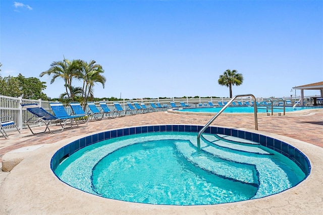 pool featuring fence