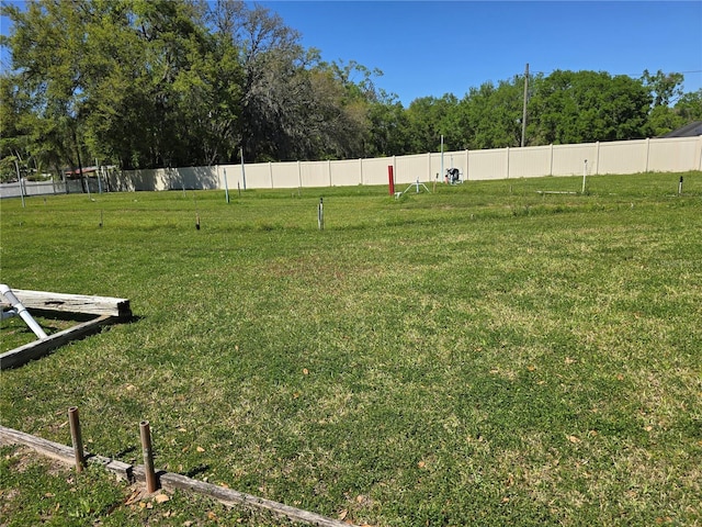 view of yard with fence