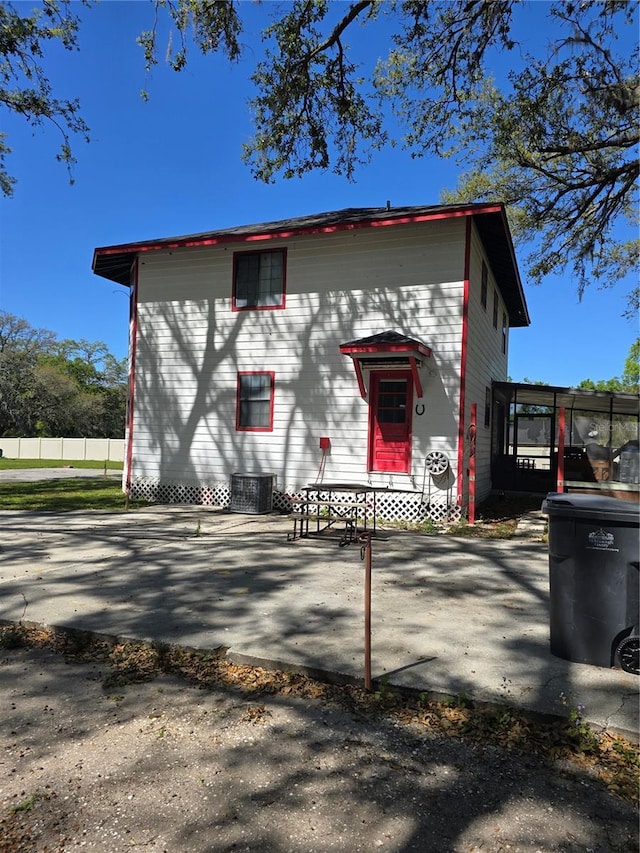 view of front of house with fence