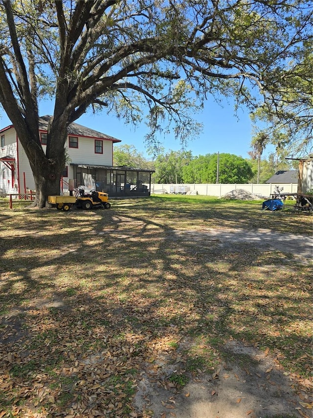 view of yard with fence