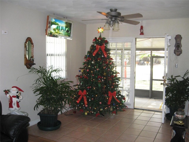 interior space featuring a ceiling fan