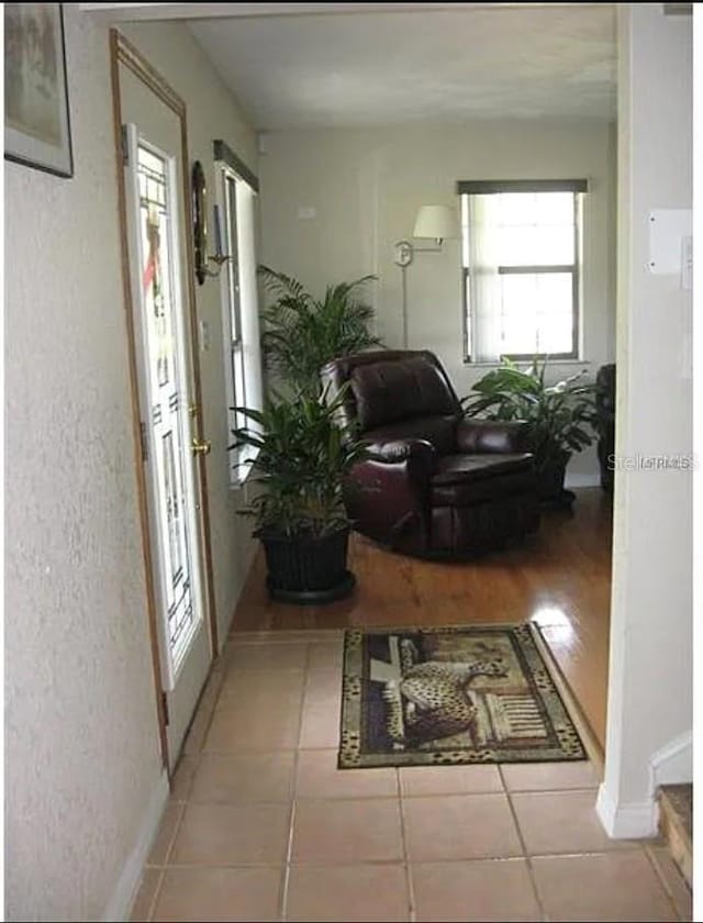 corridor with tile patterned floors