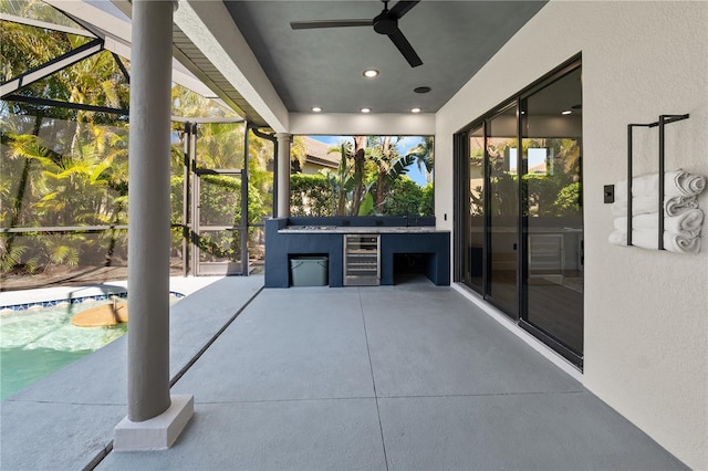 view of patio / terrace featuring ceiling fan, beverage cooler, a lanai, area for grilling, and an outdoor pool