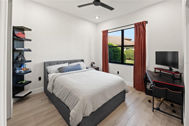 bedroom featuring a ceiling fan, light wood-style flooring, recessed lighting, and baseboards