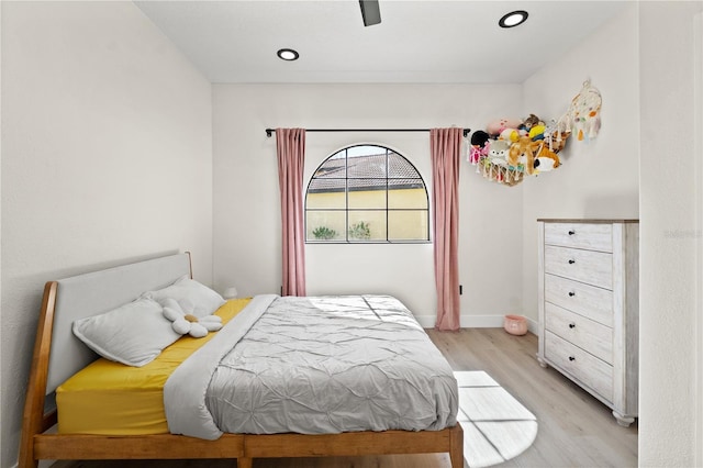 bedroom featuring recessed lighting, baseboards, light wood-style flooring, and a ceiling fan