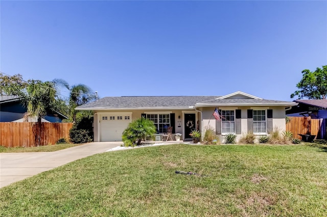 single story home with driveway, a front yard, a garage, and fence