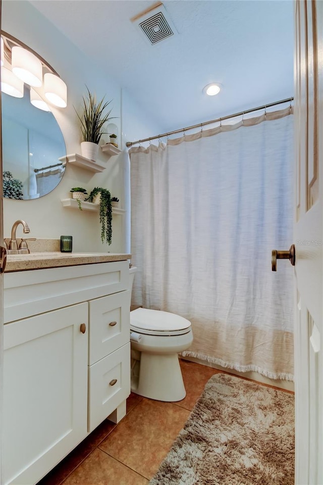 full bath featuring tile patterned floors, visible vents, toilet, and vanity