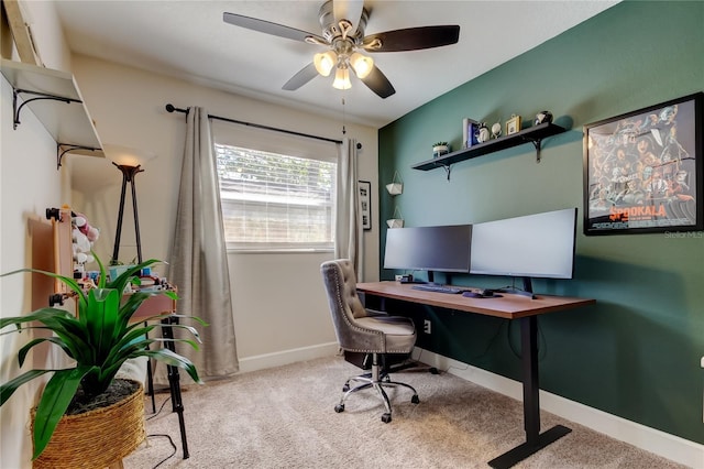 office with baseboards, carpet, and a ceiling fan